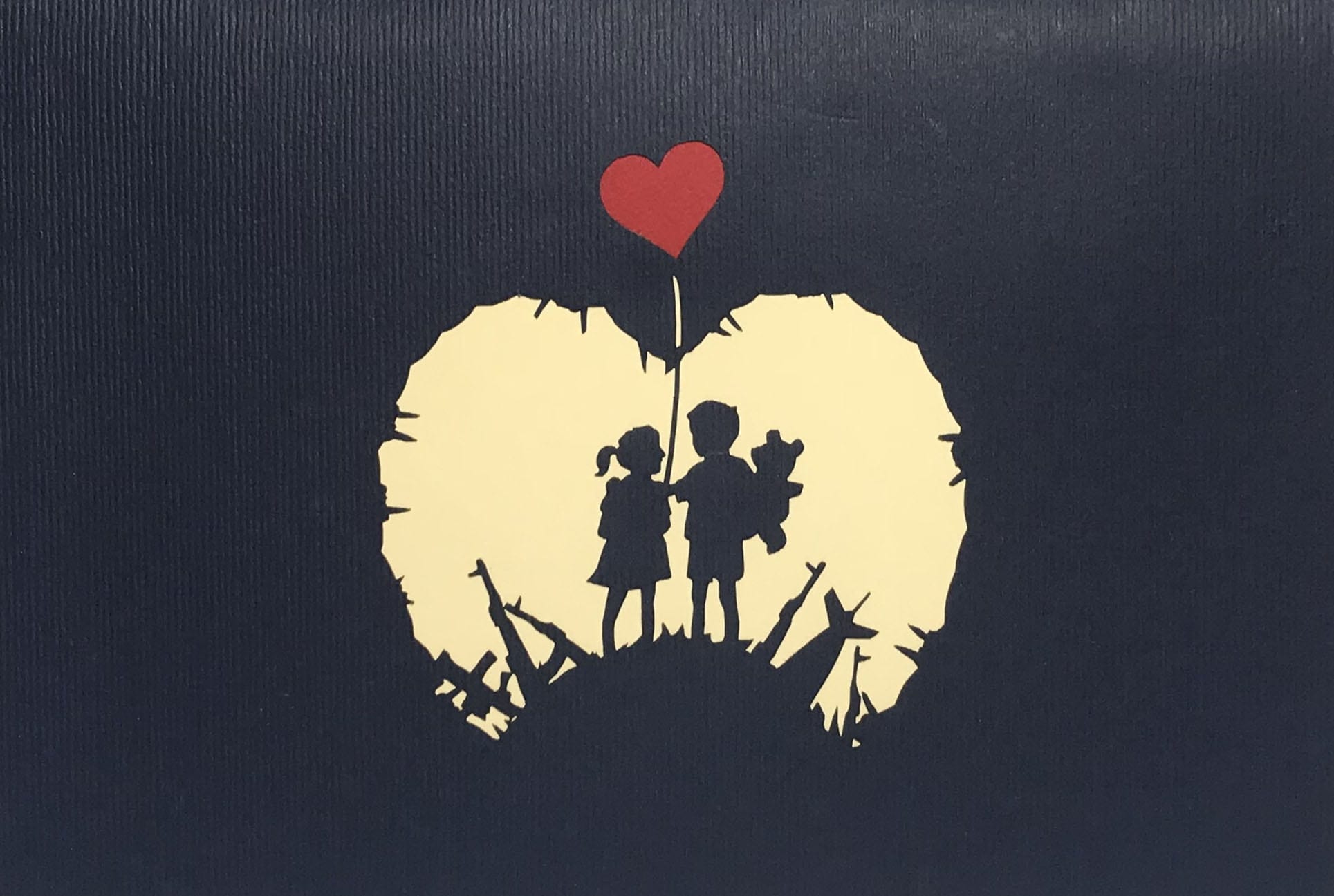 silhouettes of a young boy and girl as they stand with each other on a hill of weapons and instruments of mass destruction.